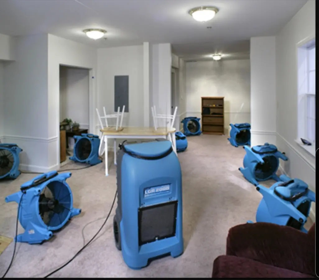 Air movers and dehumidifier setup for Water Damage Restoration in Olyphant