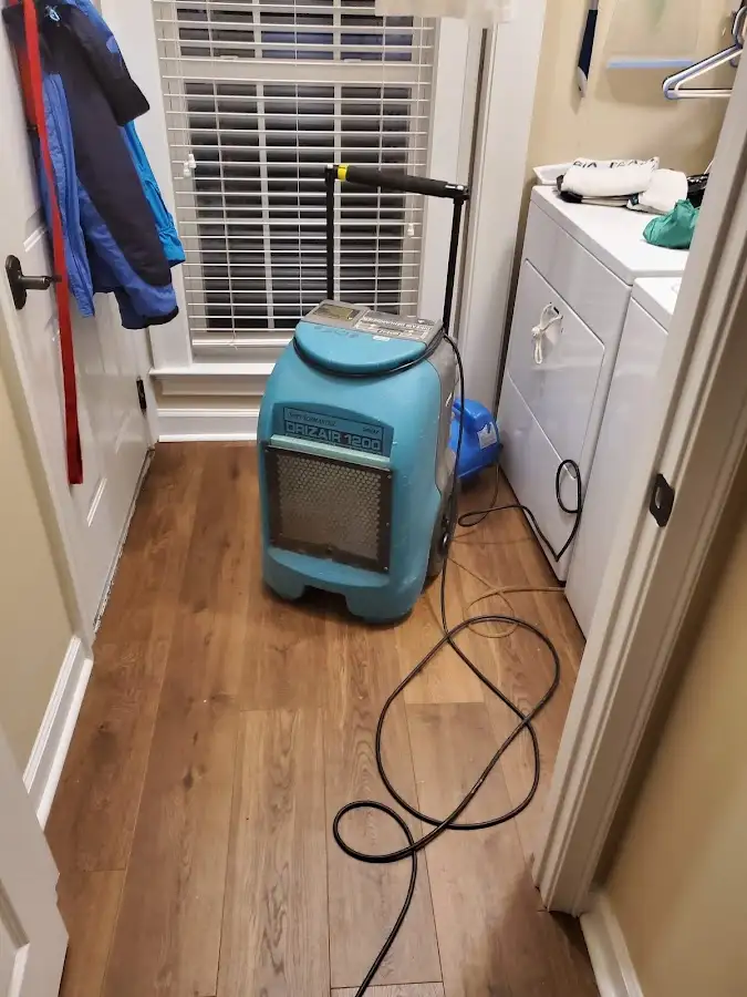 Commercial dehumidifier deployed for Flood Damage Cleanup in Olyphant